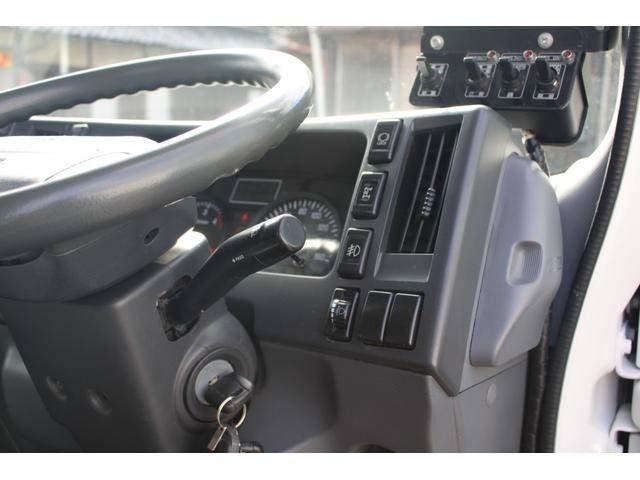 いすゞエルフパッカー車（塵芥車）小型（2t・3t）[写真35]