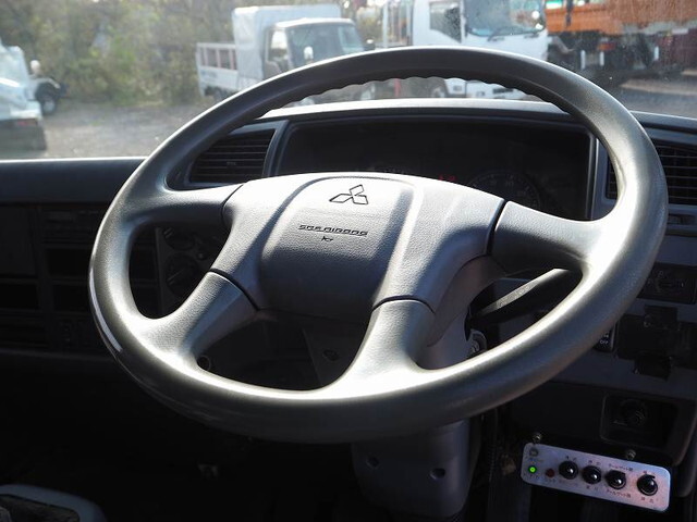 三菱ふそうファイターパッカー車（塵芥車）中型（4t）[写真35]