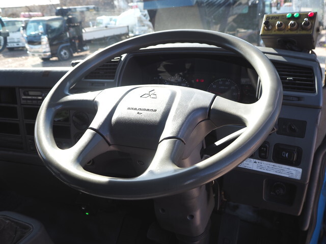 三菱ふそうファイターパッカー車（塵芥車）中型（4t）[写真37]
